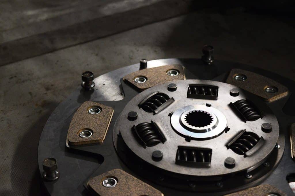 A close up of a metal clutch plate.