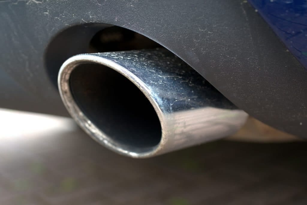 A close up of a car exhaust pipe.